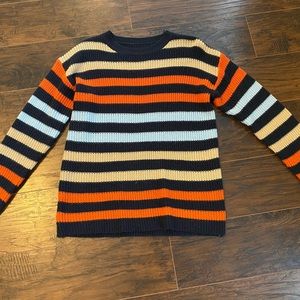 Woman’s small knit sweater